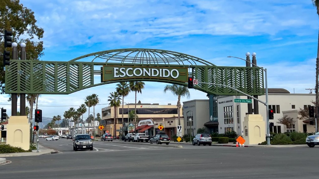 Escondido gateway sign over a city street in Escondido, California.