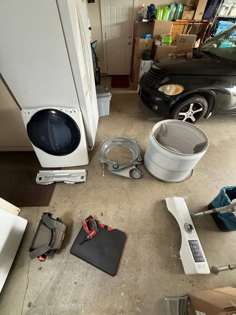 Washer teardown and drum service in garage