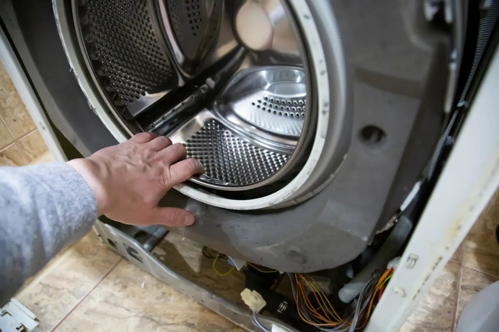 Modern dryer appliance in a home laundry room.